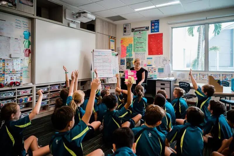 Primary school students participating in an interactive class exercise