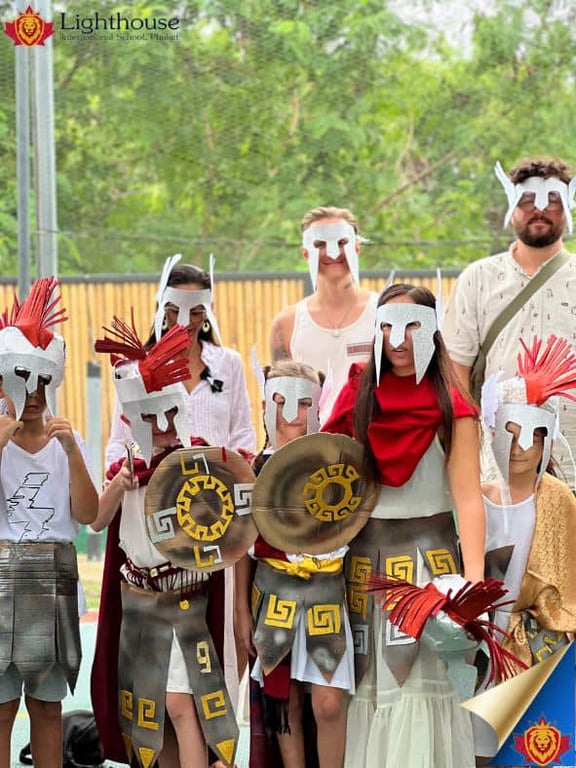 Students and parents in Greek warrior outfits for International Week.