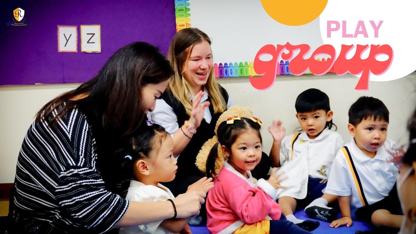 Parents and nursery kids in the play group class.