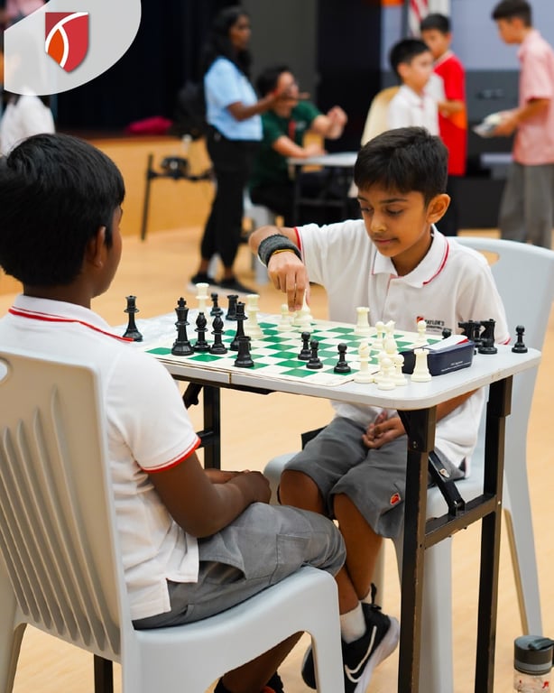Students pitting their wits against each other in the TISKL Chess Competition.