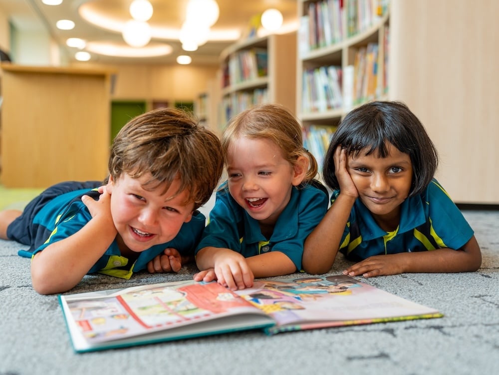 Early Years students enjoying our specially designed library spaces