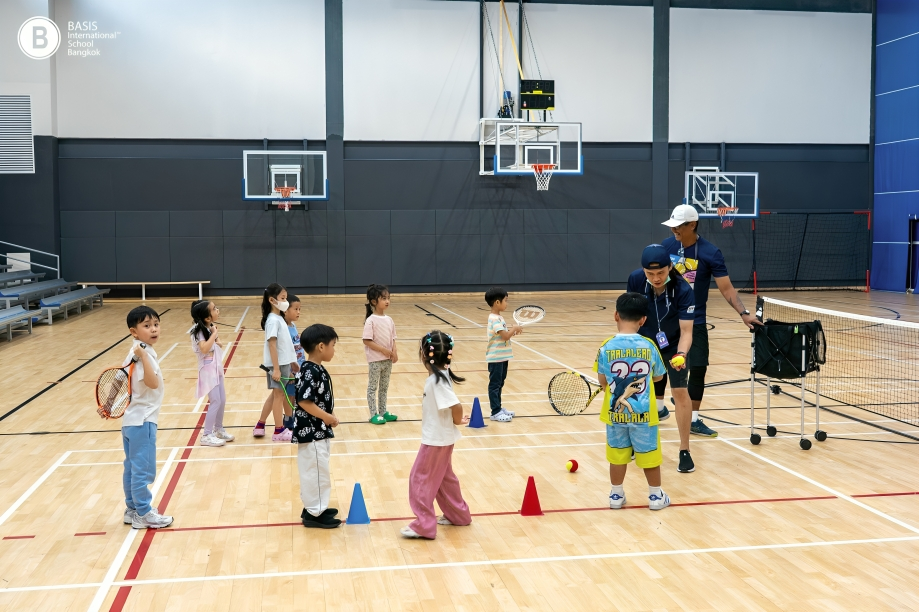 Young learners discover movement and coordination through engaging indoor sports activities.