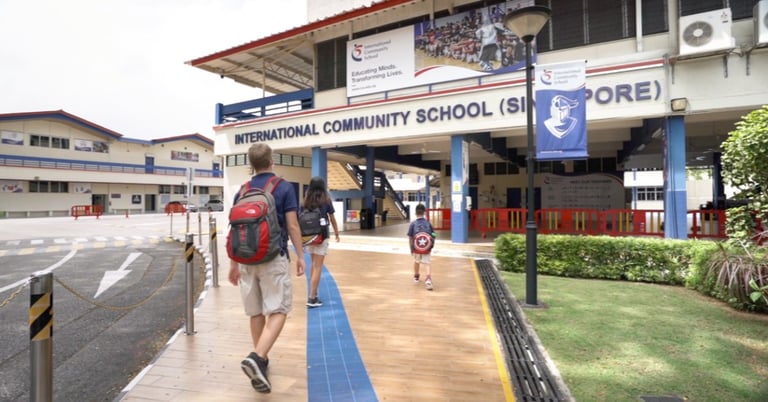 Students walking towards the Main building of ICS