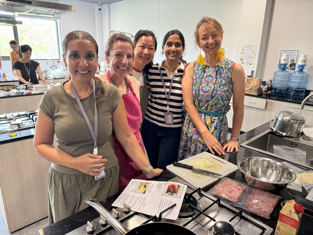 Parents taking part in the RSTPA Cooking Class featuring Italian recipes.
