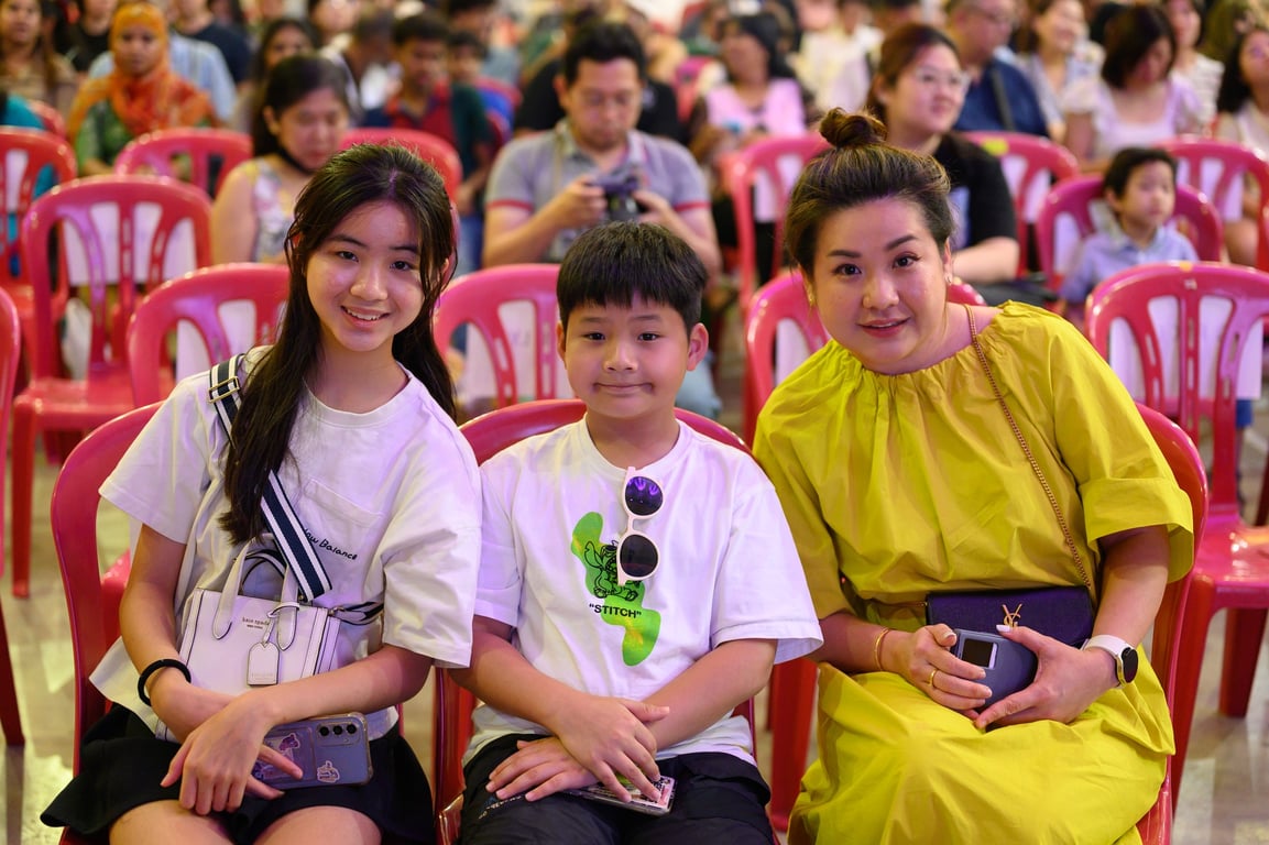 Parents and students in the audience for the school's theatrical production of Beauty and the Beast.