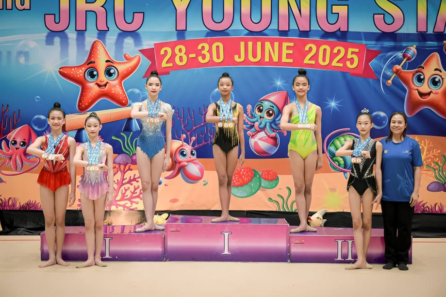 Gymnastics competition winners proudly display their medals.