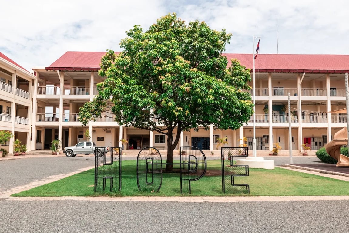 An exterior view of the multi-story academic buildings surrounding the main school courtyard.