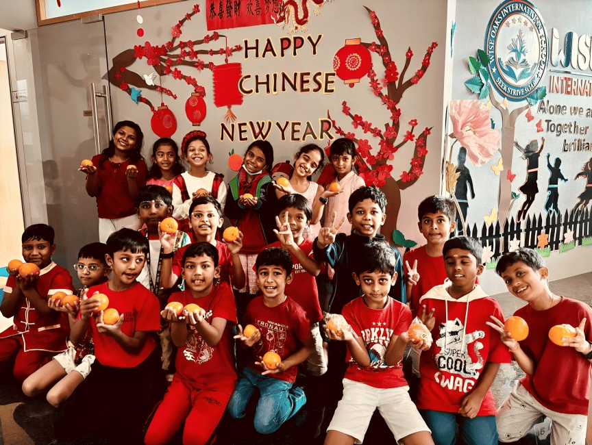 Spreading joy with oranges and smiles this Chinese New Year at Wise Oaks.