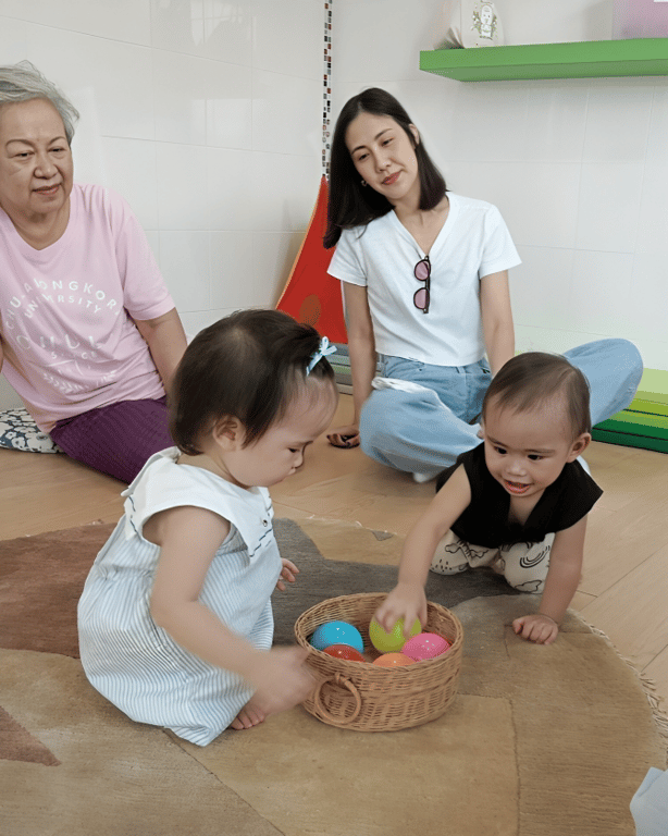 Toddlers explore colors and textures with joyful curiosity.