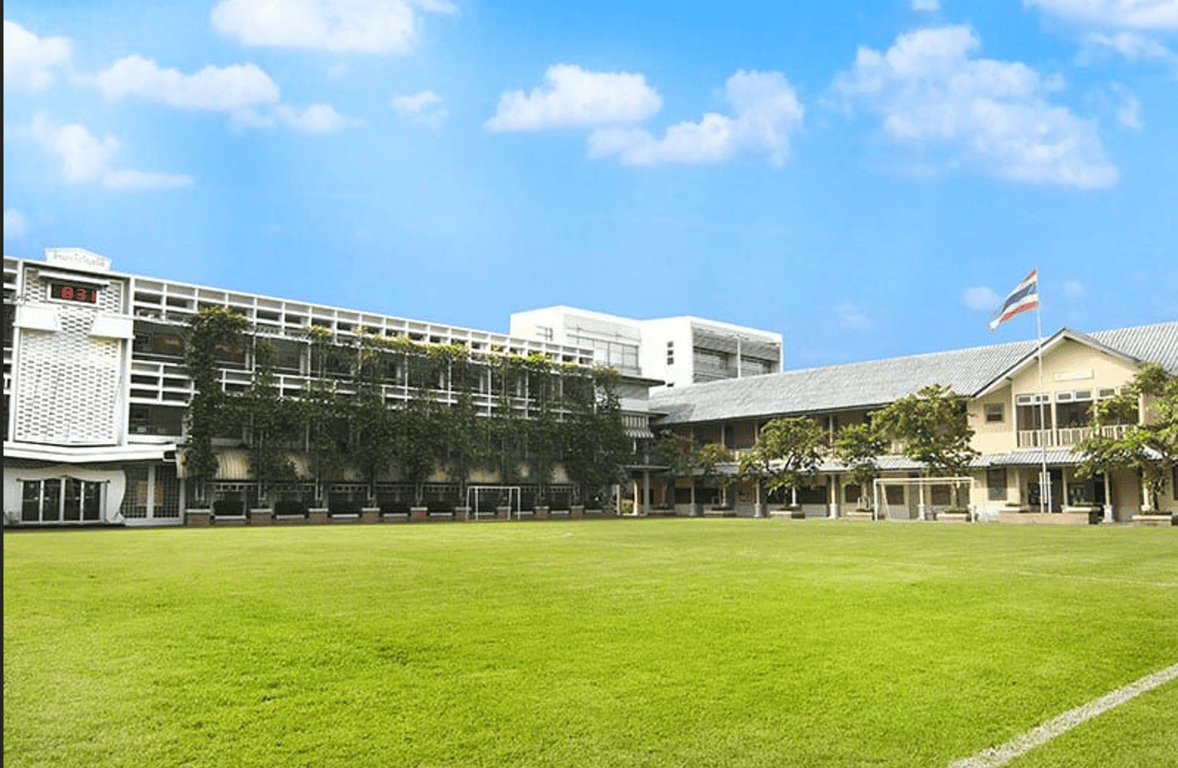 Main entrance and school field at Amnuay Silpa School.