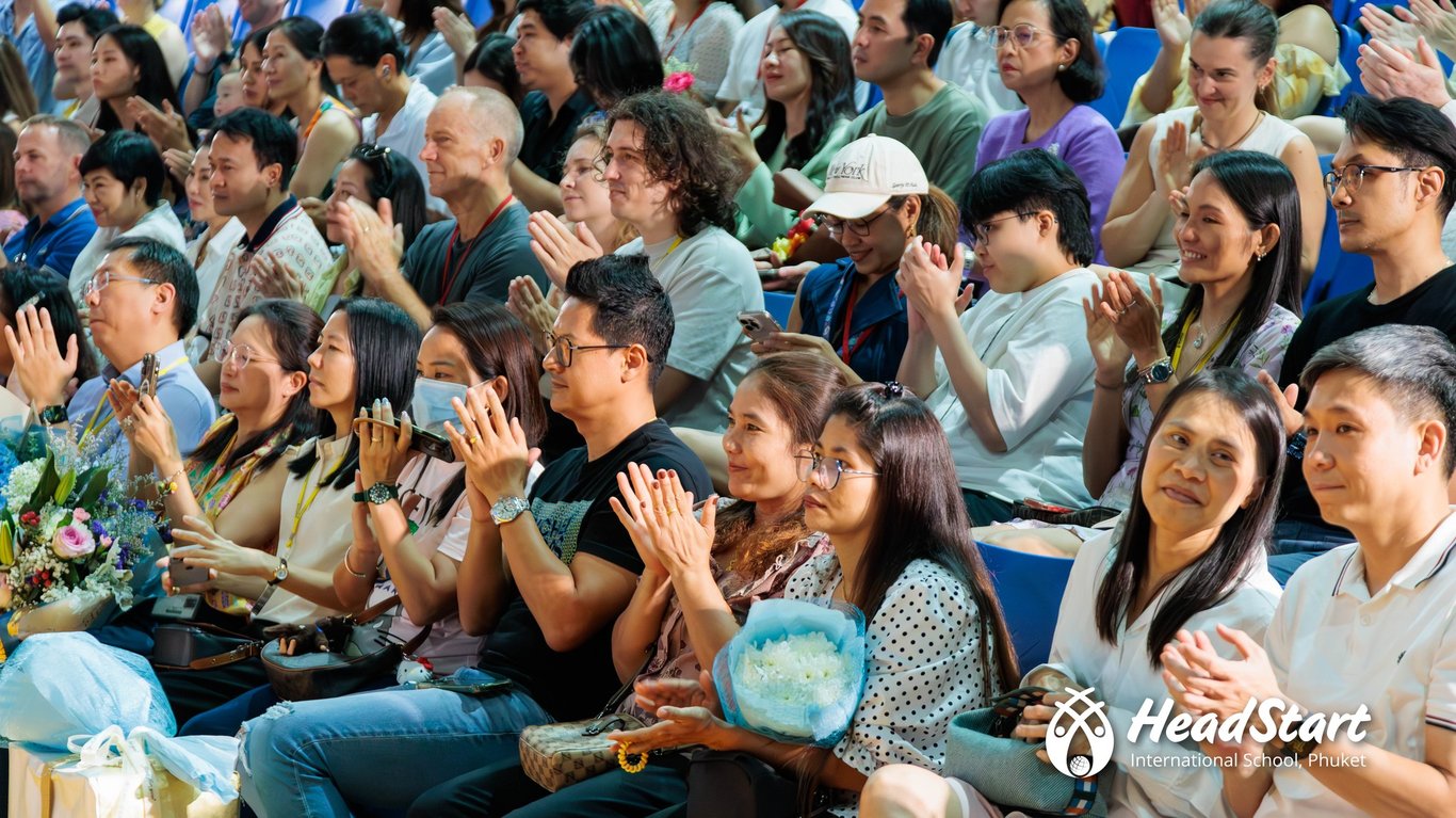 Parents and families applauding students at the Primary End of Year Awards.
