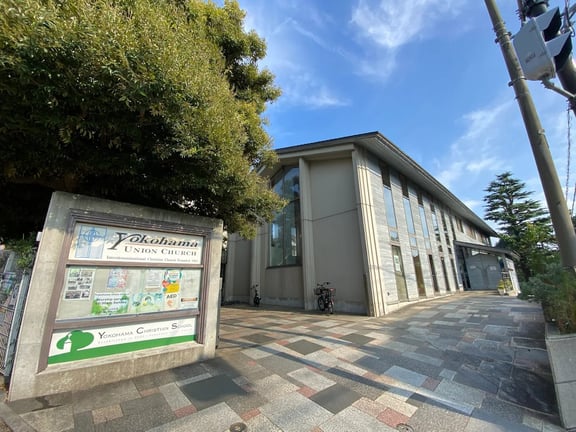 Campus walkway leading to Yokohama Christian School facilities.