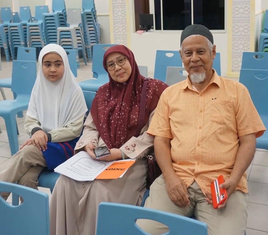 Parents attend with their child to celebrate Checkpoint results.