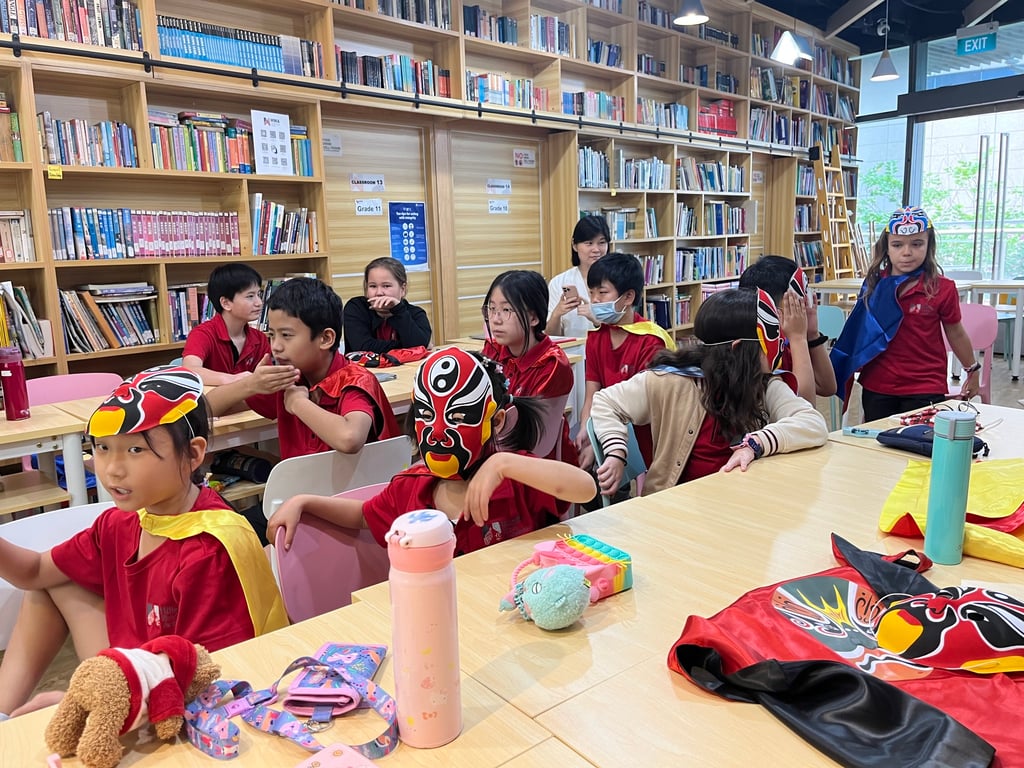 Students learning about the art of Sichuanese 'Face Changing' in their Chinese Culture class