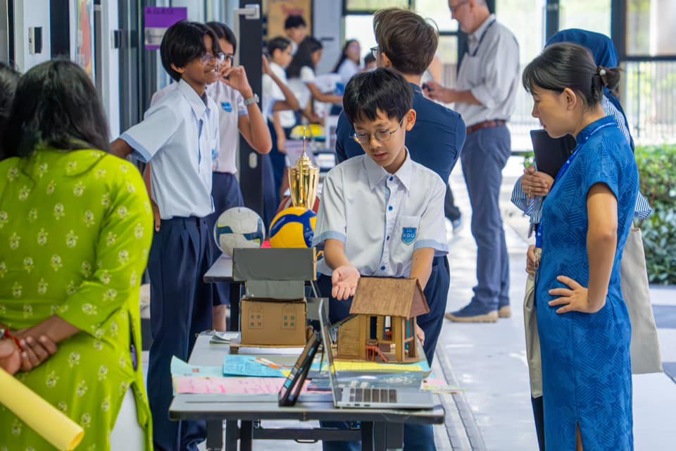 Students present their work to families during the KS3 showcase, a  great opportunity for parents to see the progress made through the academic year