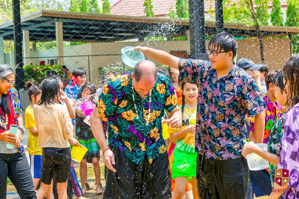 The school community taking part in the traditional Songkran ceremony.
