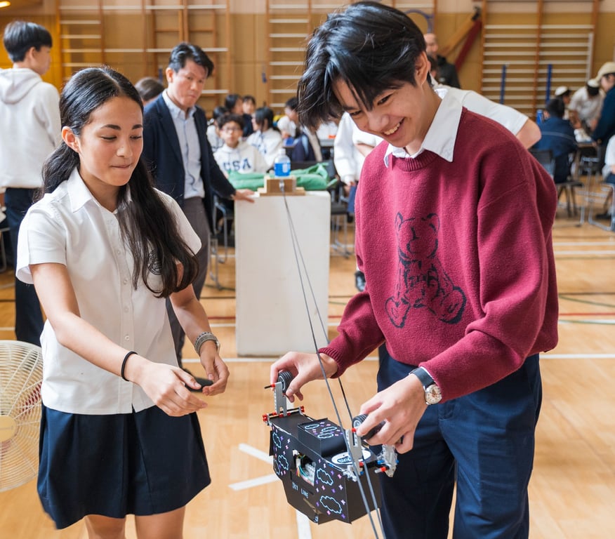 Elsa High School students testing designs during the STEAM Week Cableway Challenge.