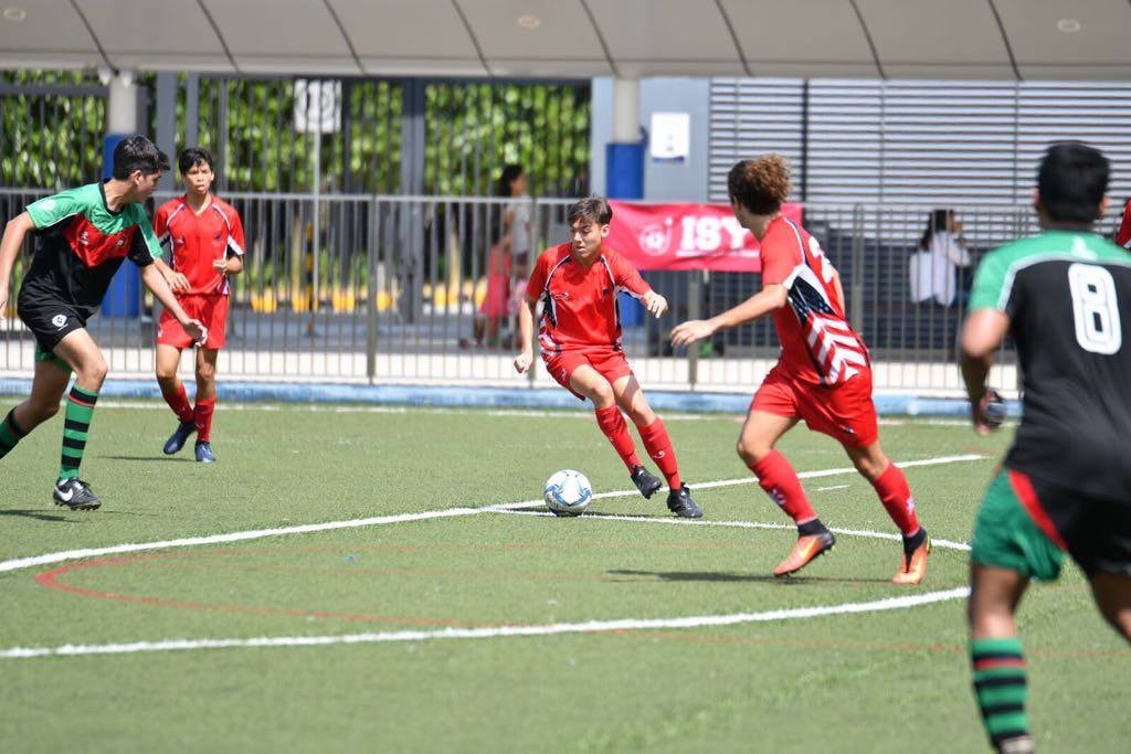 A football match being played during a three day tournament hosted by SAIS