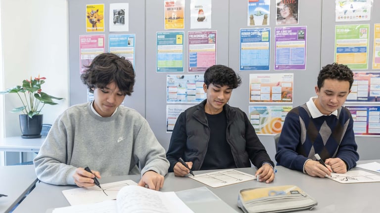Year 12 students working collaboratively during a class discussion.