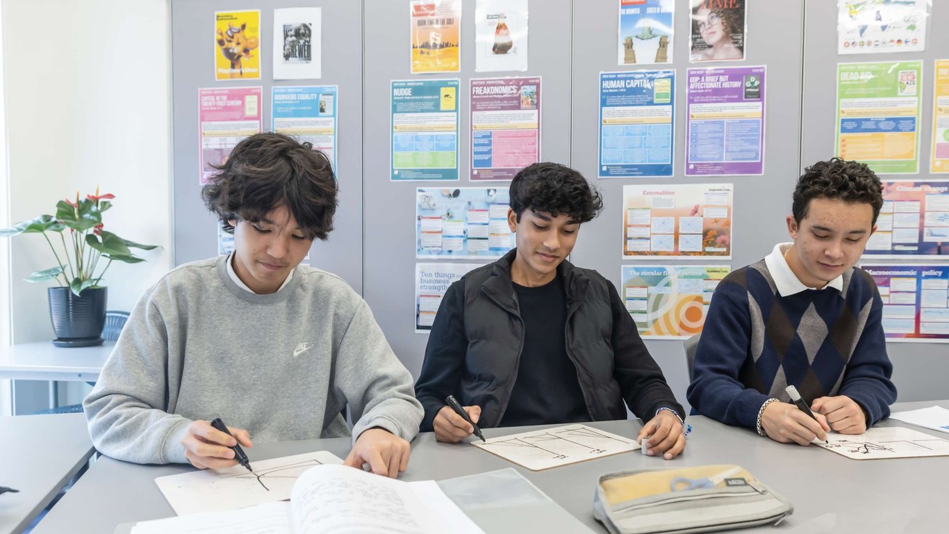 Year 12 students working collaboratively during a class discussion.