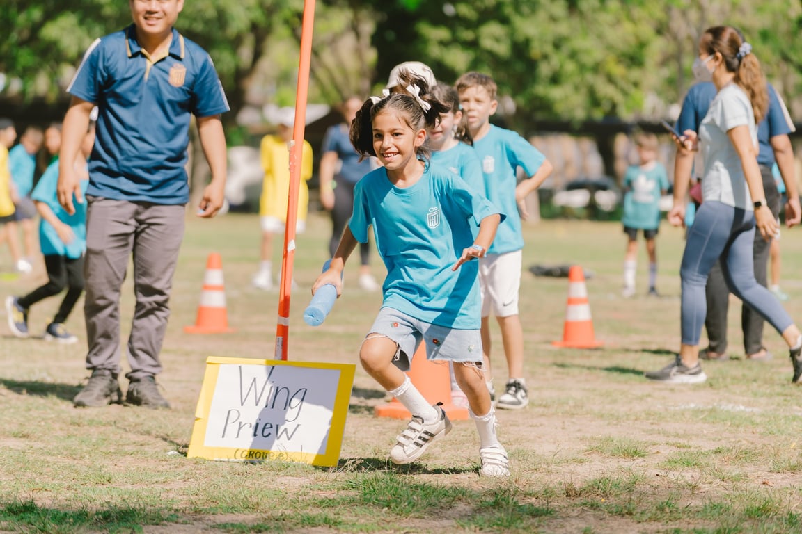 Students taking part in a relay race during Finnway's Sports Day.