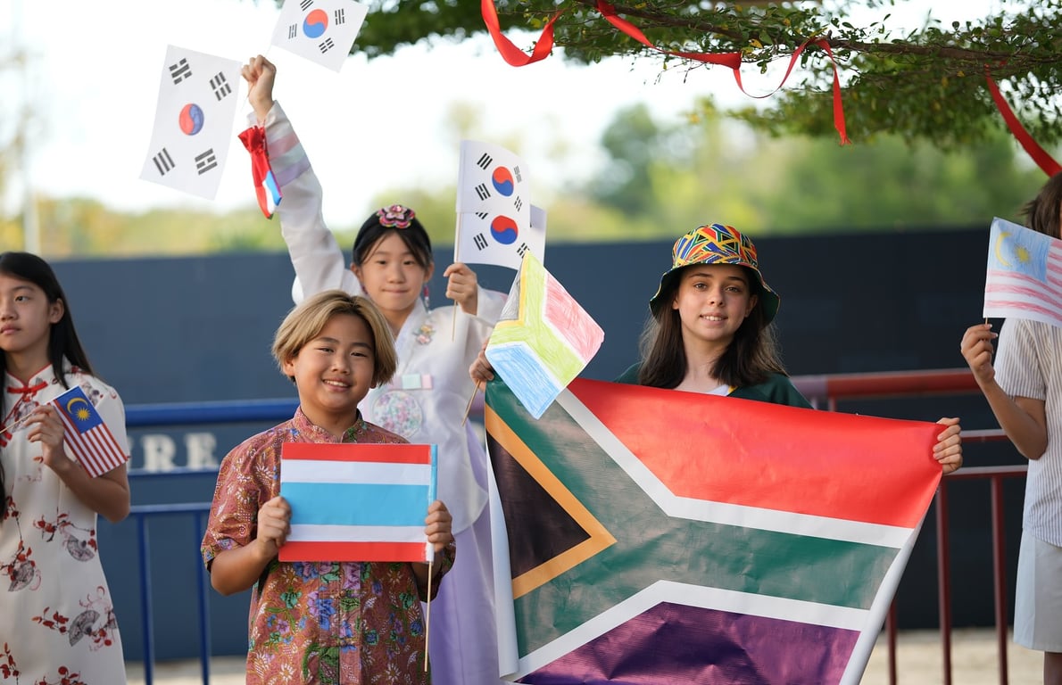 Students proudly showcase their national flags during International Day, a celebration of the diverse cultures and communities that make up the school.