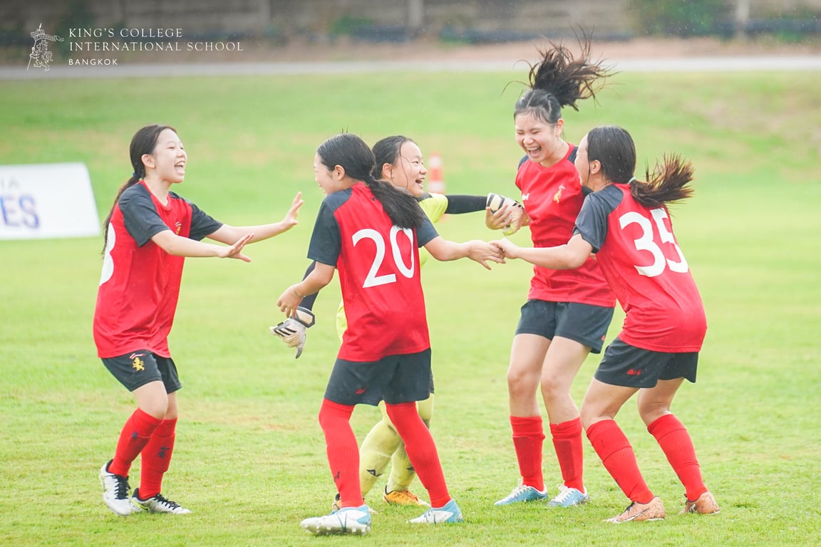 King’s Bangkok U15 girls celebrating a win at FOBISIA Games.