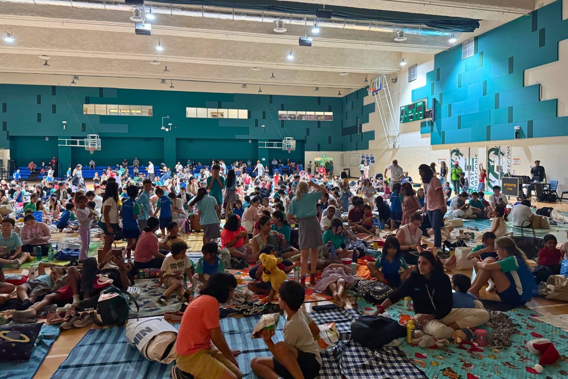 The Parents' Association on UWCSEA East held their annual Festive Movie Night, where families picnicked together at the school.