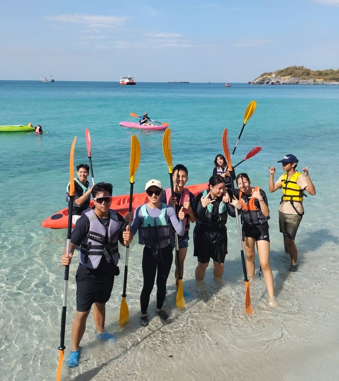 Learners explore teamwork and adventure through kayaking activities.