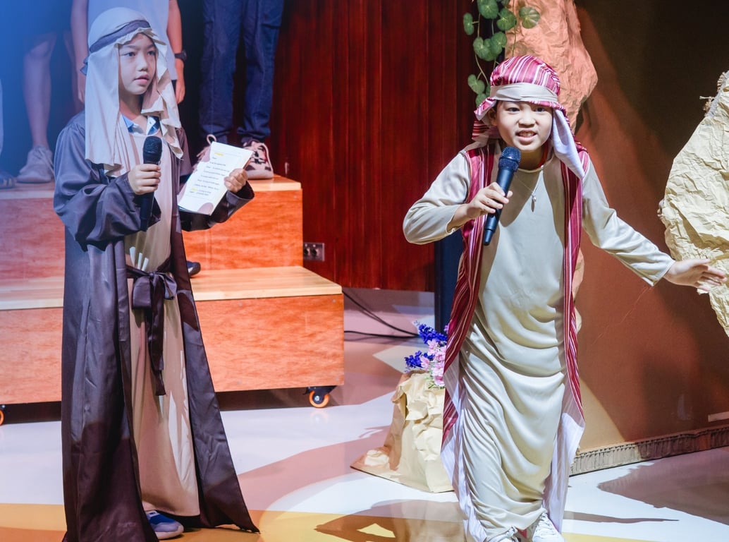 On-stage performance by students at Friday Fun Night.