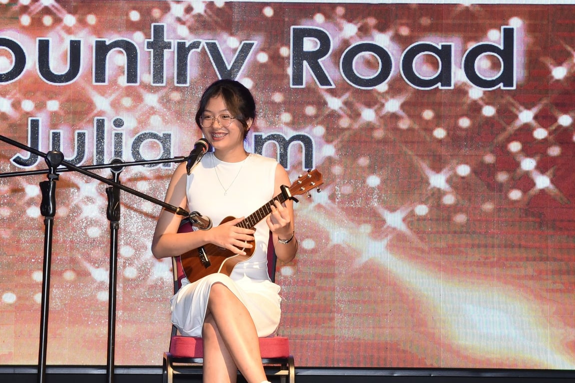 Graduation night performance featuring music and song.