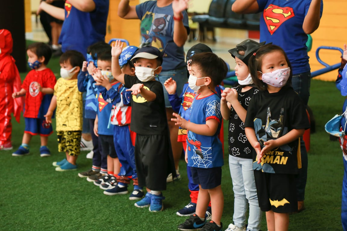 Students wearing masks as part of health and safety awareness.