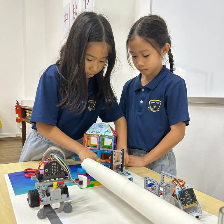 Primary students working on a robotic solution for water availability and sustainable management, as part of a Primary School competition