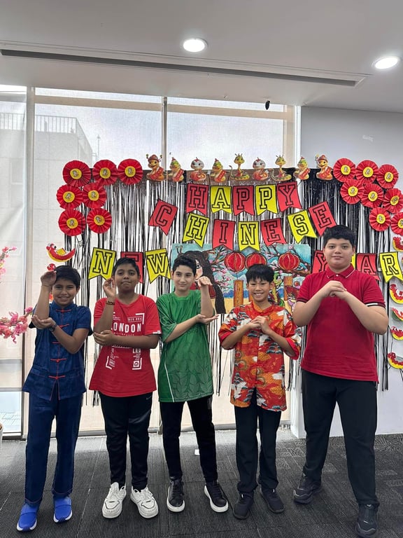 Students celebrate Year of the Snake at the school's Chinese New Year event.