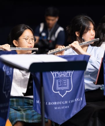 Students showcase their talents in the school orchestra, bringing harmony and confidence to the stage.
