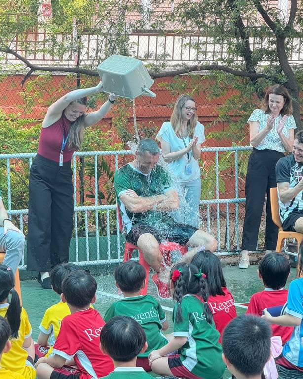 Teachers getting soaked for a school charity event.