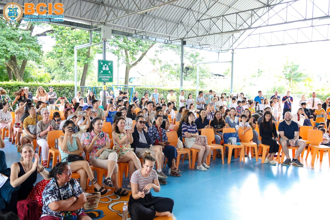 The school community attending talent showcase.