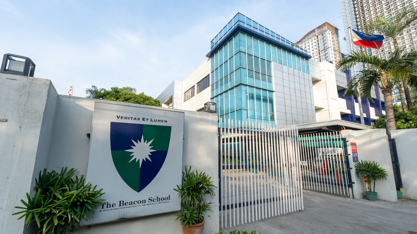 The main entrance and gate of The Beacon School campus.