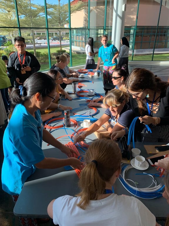 Parents and community members join a craft workshop hosted during Parent Coffee Morning.