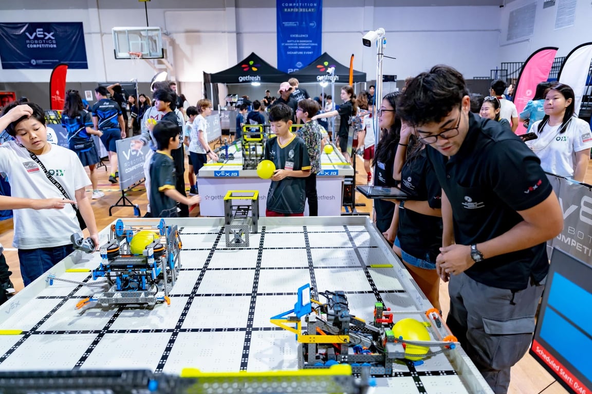 Students fine-tune their entries during the Thailand Cup tournament.