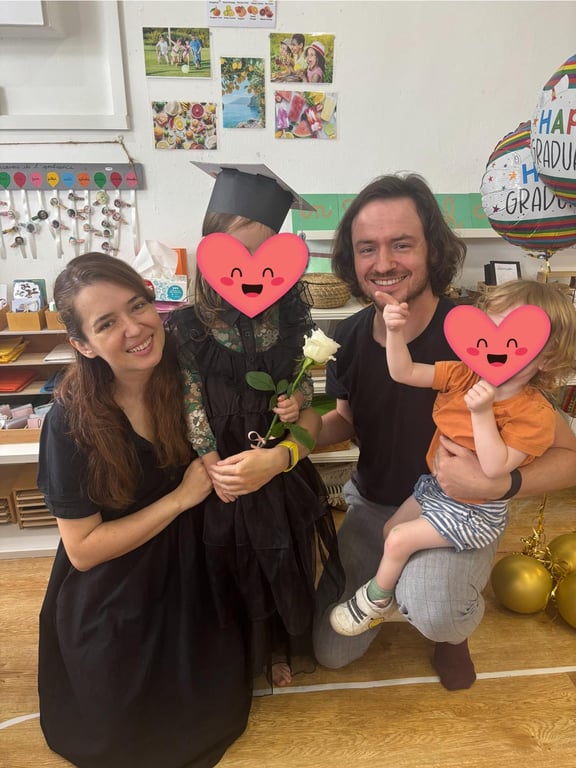 A proud moment shared with family at graduation ceremony.