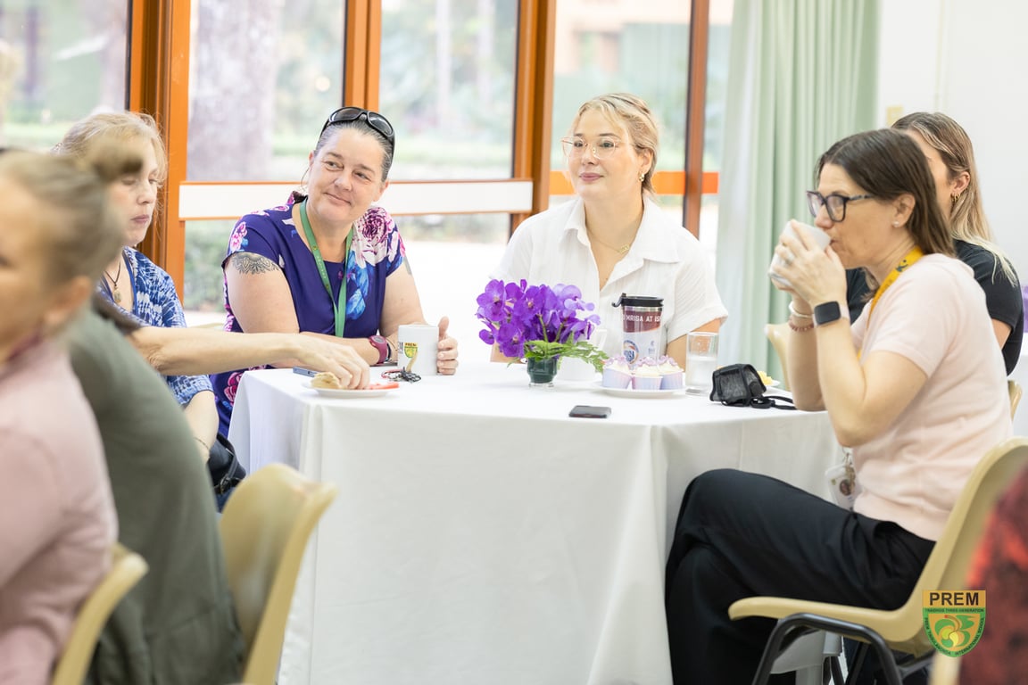 Prem hosting a Women’s Day breakfast.