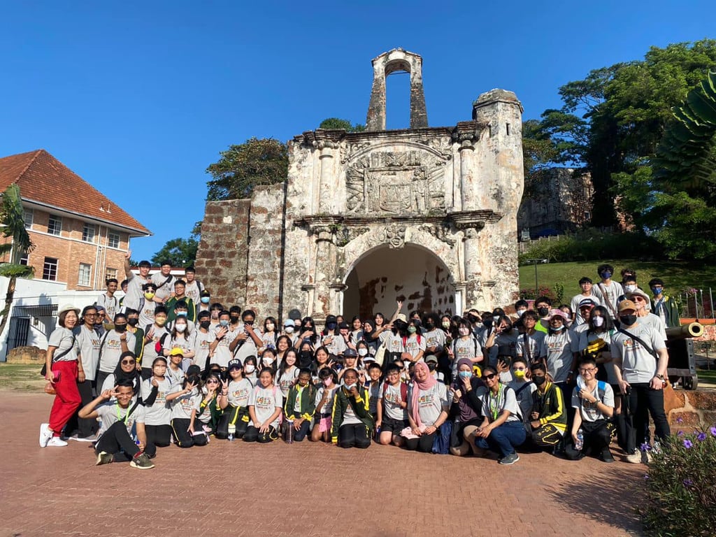 Upper primary and secondary students gather at A Famosa, Melaka’s historic Portuguese fortress, during a cultural heritage learning trip.