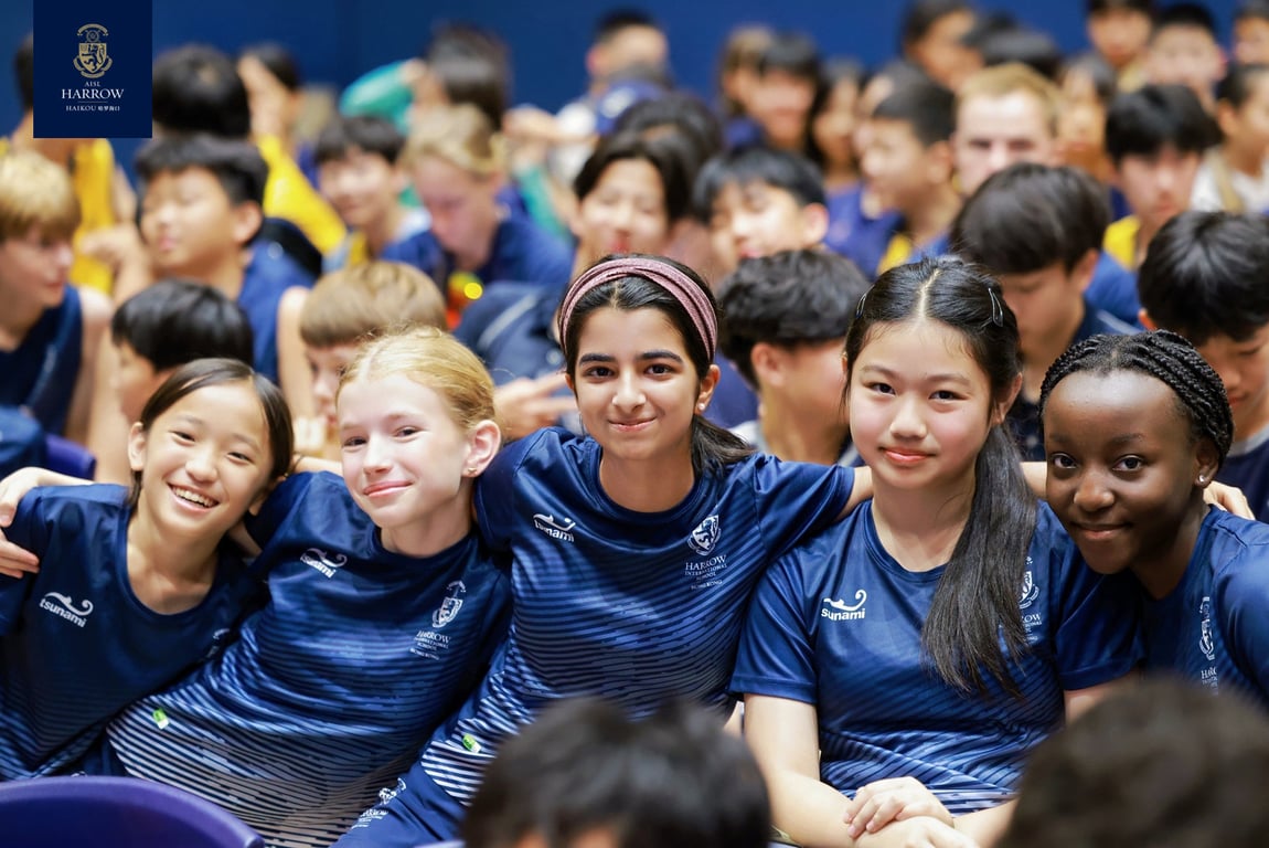 Students posing at the Harrow Games opening assembly.