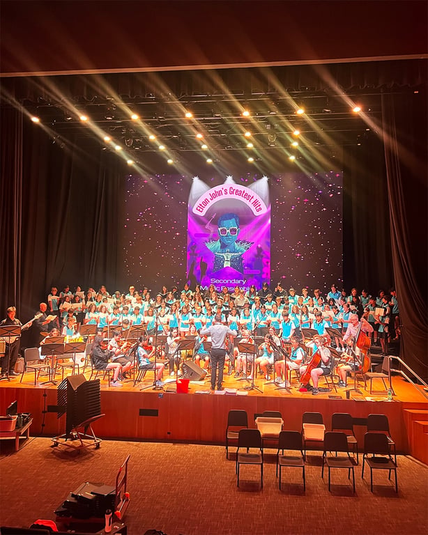 The school's secondary music ensemble performing a concert of Elton John hits.