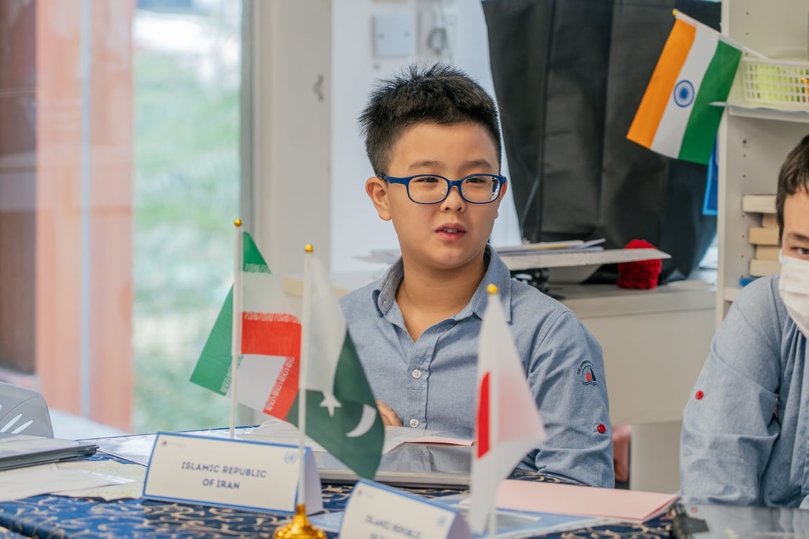 Grade 6 student representing a country during the Model United Nations conference.