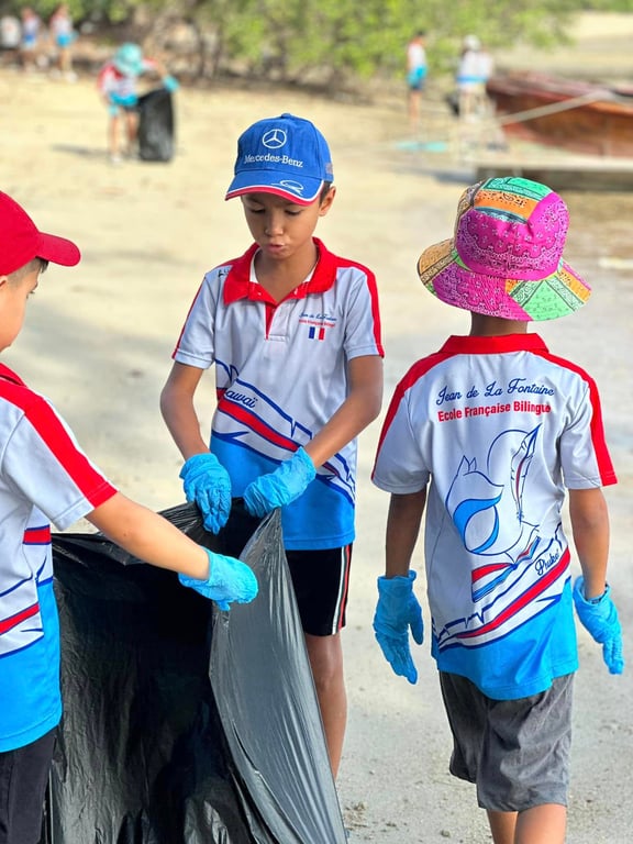 Waste collection activity taking place on a local shoreline.