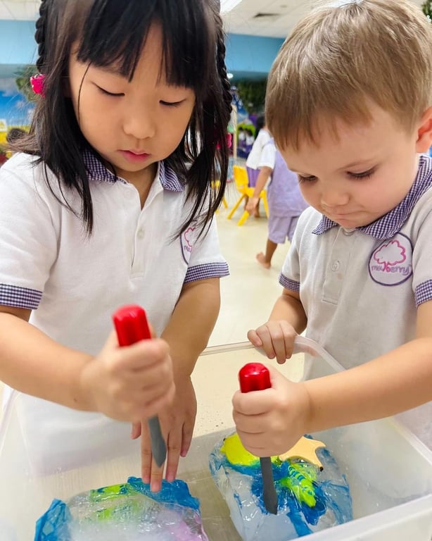 Children learning to use 'tools' in an activity about ecological awareness