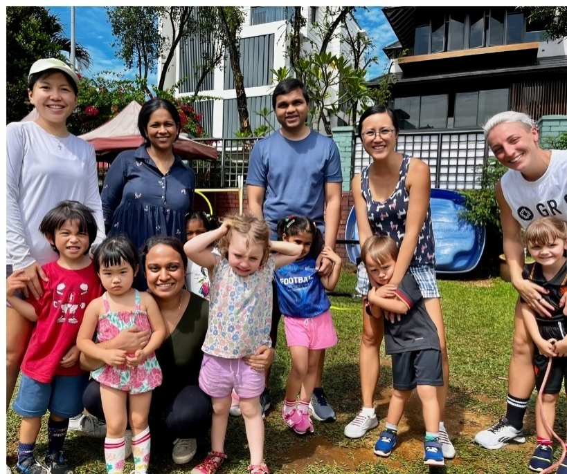 Families posing together during the first Sports Day at Bukit Timah.