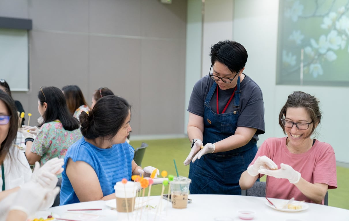 Parents attending a hands-on workshop at the school.